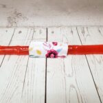Couvre bâton glacé Taille & Retailles en tissu Fleuri
