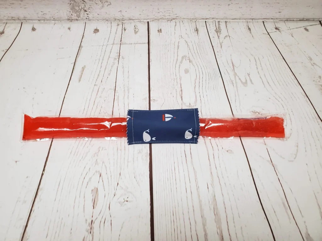 Couvre bâton glacé Taille & Retailles en tissu Bateaux-baleines