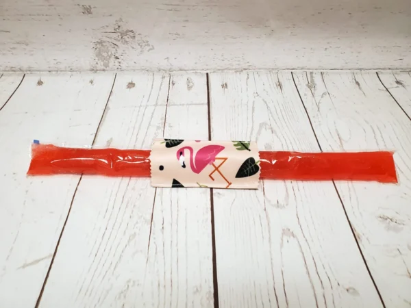 Couvre bâton glacé Taille & Retailles en tissu Flamants