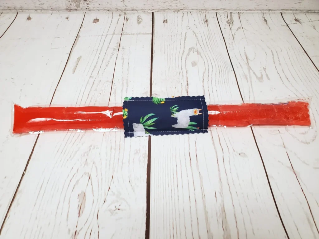 Couvre bâton glacé Taille & Retailles en tissu Lamas