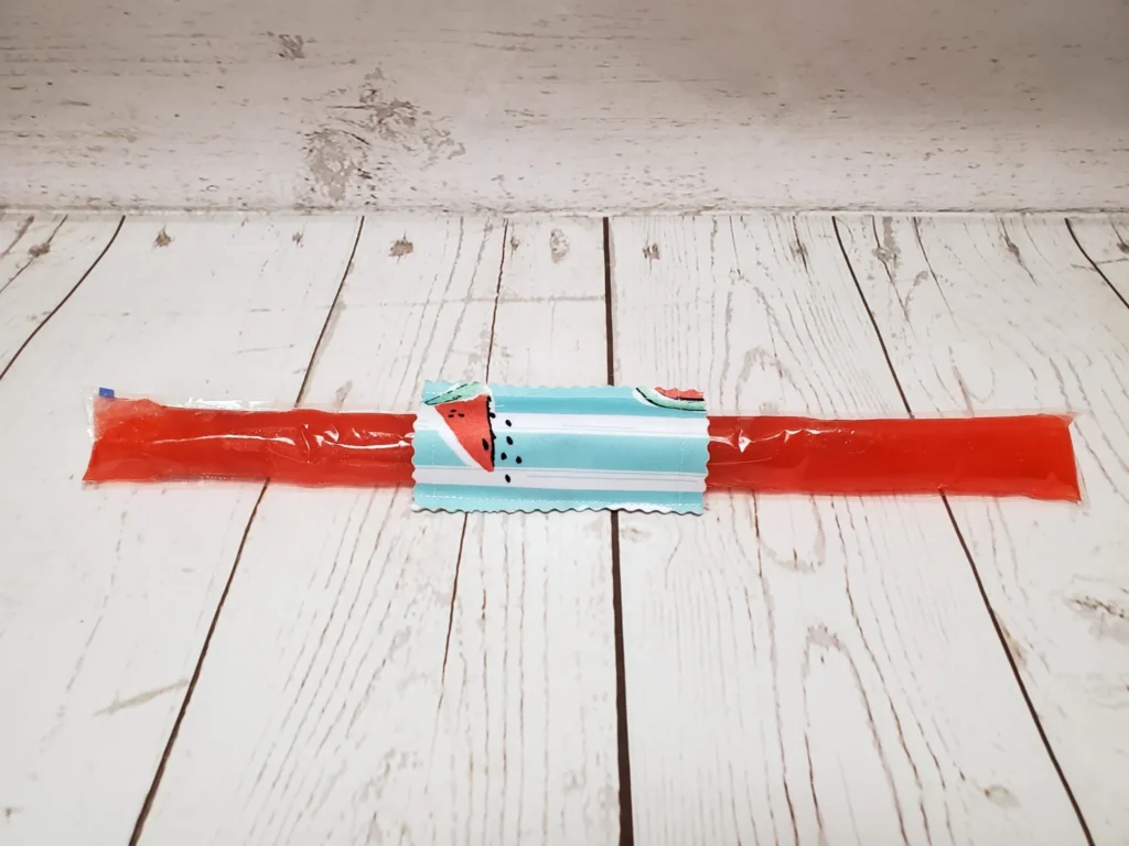 Couvre bâton glacé Taille & Retailles en tissu Melons