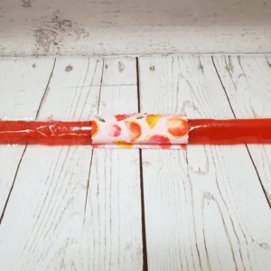 Couvre bâton glacé Taille & Retailles en tissu Pamplemousse rose