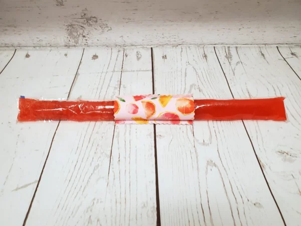Couvre bâton glacé Taille & Retailles en tissu Pamplemousse rose